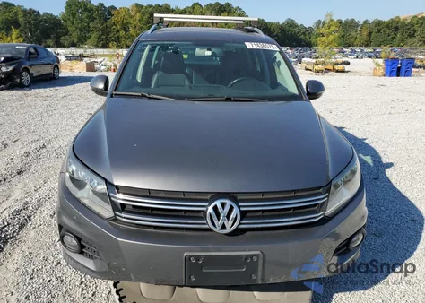 2014 Volkswagen Tiguan S from USA, damaged, VIN WVGAV3AX1EW548396